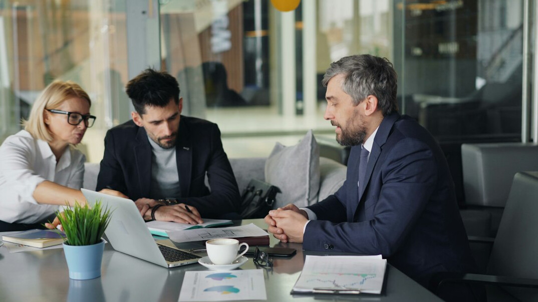 business team reviewing cybersecurity measures