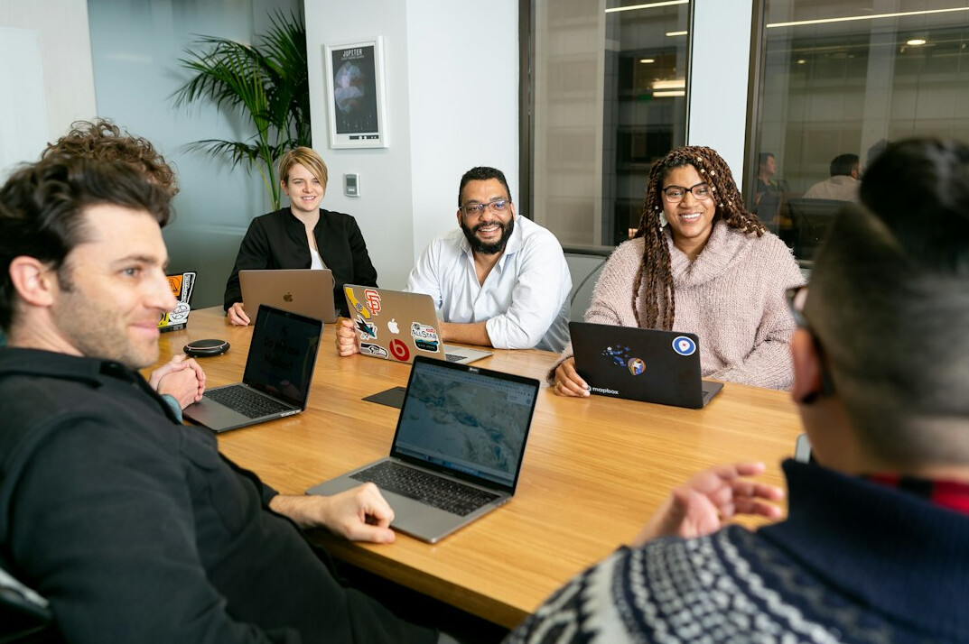 team collaborating on digital security
