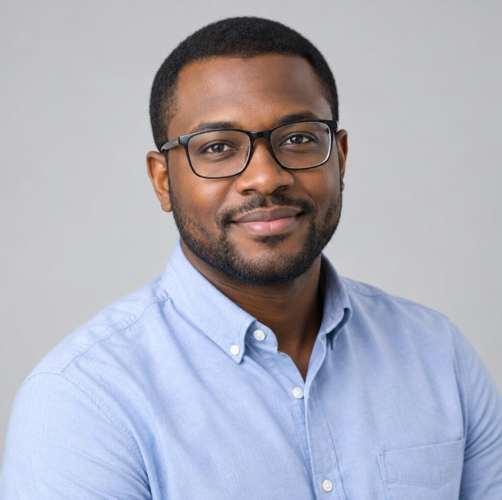 Portrait of a man wearing glasses and a shirt